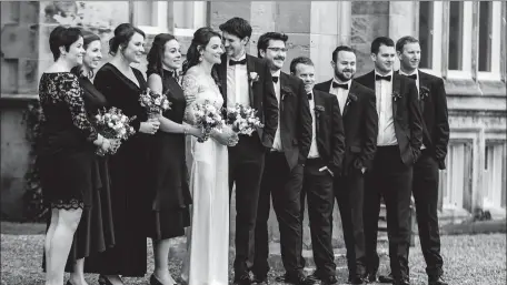  ??  ?? The wedding of Diarmuid Coakley and Ann McEnery of Muckross took place on New Years Day. They are pictured here with their bridesmaid­s and groomsmen.