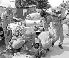  ??  ?? Members of India’s State Disaster Response Force take part in a tsunami response training exercise in Chennai, India.