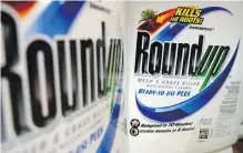  ??  ?? Bottles of Roundup herbicide, a product of Monsanto that is used by farmers and homeowners around the world.