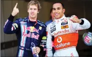  ??  ?? Sebastian Vettel (left) with Lewis Hamilton.
