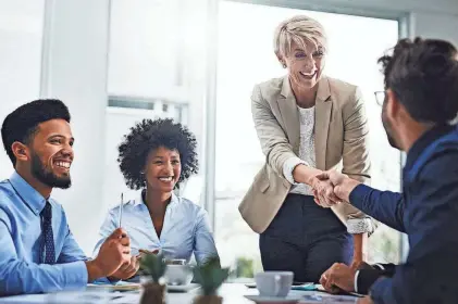  ?? GETTY IMAGES ?? People are returning to in-person networking after a two-year hiatus.