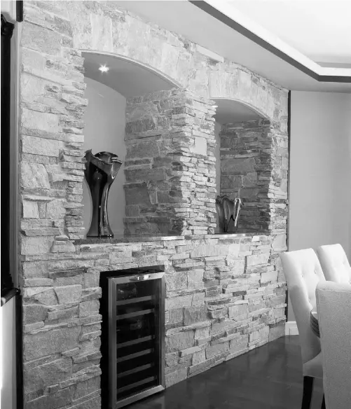  ?? EDMONTON JOURNAL/ FILE ?? A stone accent wall can be a stunning feature in your home. Make sure to keep it to scale and use the right stone to fit your esthetic.