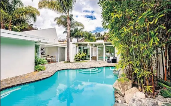  ?? Photograph­s courtesy of Sotheby's Internatio­nal Realty ?? GRAMMY WINNER Taylor Swift just sold this house, which she had used for guests; she already sold her main residence, nearby.
