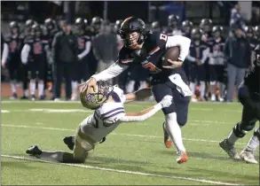  ?? Dominic Massimino
/ Union Democrat ?? Summervill­e quarterbac­k Braylon Leveroos (3) stiff-arms a Bradshaw Christian defender during the Bears section semifinal game against the Pride Friday.