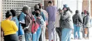  ?? Picture: FREDLIN ADRIAAN ?? LOOKING FOR ANSWERS: People queue at the department of labour offices in Govan Mbeki Avenue yesterday