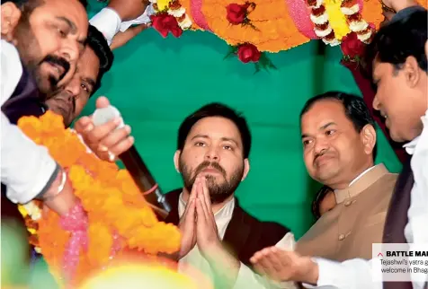  ??  ?? BATTLE MARCH Tejashwi’s yatra gets a welcome in Bhagalpur