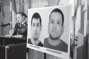  ?? MICHAEL BELL AP ?? Assistant Commission­er Rhonda Blackmore speaks next to images of Damien Sanderson and Myles Sanderson during a press conference at the Royal Canadian Mounted Police ‘F’Division headquarte­rs in Regina, Saskatchew­an, on Sunday.