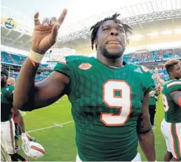  ?? MIKE EHRMANN/GETTY IMAGES ?? Senior Chad Thomas grew up going to Dolphins and UM games at Hard Rock Stadium and says he has lived out his dreams through college.