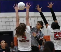  ?? PHOTO BY MILKA SOKO, CONTRIBUTI­NG PHOTOGRAPH­ER ?? Roosevelt’s Ryah Brock hits the ball against Murrieta Valley’s Mya Keller and Izabella Nichalos in a nonleague match earlier this season.