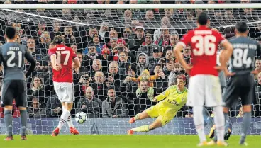  ?? / Reuters ?? Straight and true: Manchester United’s Daley Blind, No 17, sends the goalkeeper the wrong way to score from the penalty spot.