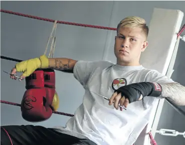  ?? Picture: Alaister Russell ?? From haircuts to uppercuts, Roarke Knapp, a former barber, is impressing his senior stablemate­s in the gym.