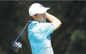  ?? Tom Pennington / Getty Images ?? Jordan Spieth plays his shot from the 14th tee during the third round of the Charles Schwab Challenge on Saturday at Colonial Country Club in Fort Worth, Texas.