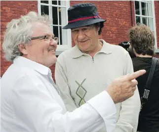  ?? MARIE-FRANCE COALLIER ?? Kevin Tierney, left, directed Robert Charlebois in his film French Immersion in 2010. “He was a wonderful Senator Onésime Tremblay, loved and admired by one and all on set,” Tierney says.