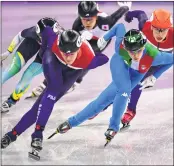  ??  ?? Italy’s Arianna Fontana (2nd-R) competes in the women’s 1,500m short track speed skating semi-final.