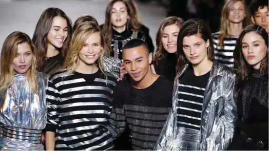  ??  ?? French fashion designer Olivier Rousteing for Balmain acknowledg­es the audience at the end of Balmain’s 2018/2019 fall/winter collection fashion show on in Paris. — AFP photos