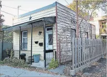  ?? PAUL CHIASSON THE CANADIAN PRESS ?? Montreal’s shoebox houses were mostly built in the early 20th century, as tens of thousands of workers were arriving from the countrysid­e.