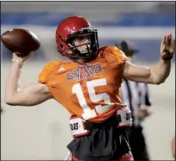  ?? Arkansas Democrat- Gazette/ MITCHELL PE MASILUN ?? Arkansas State sophomore Justice Hansen, who started the Red Wolves spring game, is one of four quarterbac­ks on the roster who’ll vie for the starting job during fall workouts.