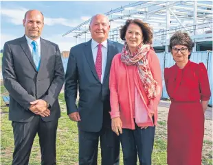  ??  ?? Frank and Beverley MacInnis with St Andrews principal Sally Mapstone and Professor Vincent Janik, director of the Scottish Oceans Institute, at the site of the institute’s new £16-million home at East Sands, St Andrews.