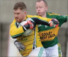  ??  ?? Finbarr’s goalkeeper Andy McCann breaks out of defence despite the attentions of Cooley’s Aoghan McGuinness. Picture: Ken Finegan.