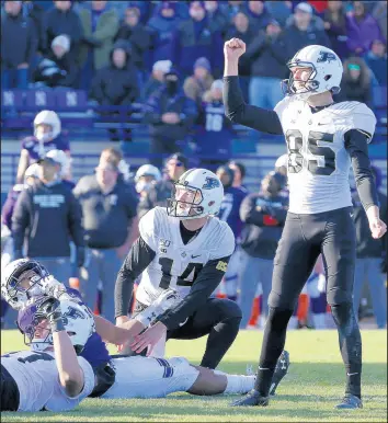  ?? JUSTIN CASTERLINE/GETTY ?? J.D. Dellinger of Purdue celebrates after the winning field goal Saturday against Northweste­rn in Evanston, Ill..