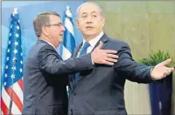  ?? AP PHOTO ?? Israeli Prime Minister Benjamin Netanyahu, right, turns to the media as he and U.S. Defense Secretary Ash Carter prepare to go upstairs to meet at the prime minister's office in Jerusalem, Israel, Tuesday.