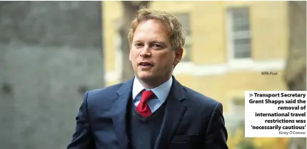  ?? WPA Pool Kirsty O’Connor ?? > Transport Secretary Grant Shapps said the removal of internatio­nal travel restrictio­ns was ‘necessaril­y cautious’