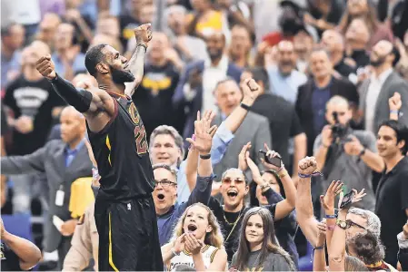  ?? KEN BLAZE/USA TODAY SPORTS ?? LeBron James celebrates the game-winner Saturday that gave the Cavaliers a 3-0 series lead against the Raptors.