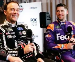  ??  ?? Kevin Harvick, left, and Denny Hamlin joke around during an interview in Daytona Beach, Fla. (Photo by John Raoux, AP file)