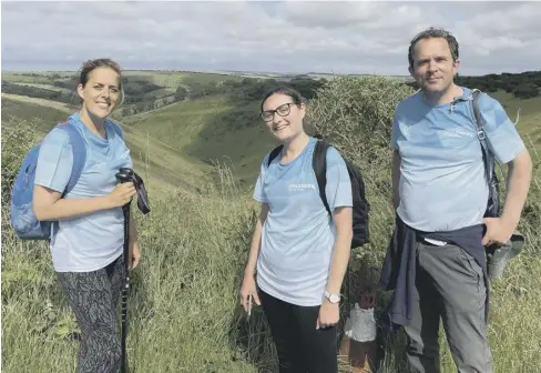  ??  ?? Michelle Lewis, Lauren Guy and Edward Cooke at Devil’s Dyke towards the end of the walk