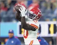  ?? Ashley Landis / Associated Press ?? Kansas City Chiefs wide receiver Tyreek Hill catches a pass against the Los Angeles Chargers on Friday. Hill has been placed on the NFL’s COVID-19 list.