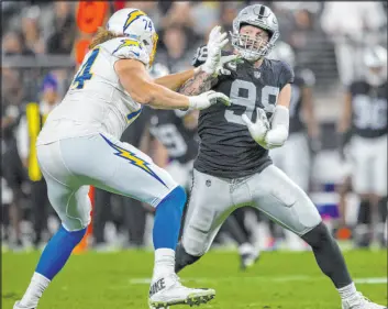  ?? Heidi Fang Las Vegas Review-journal @Heidifang ?? Raiders defensive end Maxx Crosby’s role in the new 3-4 defensive scheme could expand this season from a pure down lineman to a hybrid upright edge rusher.