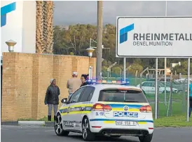  ?? /AFP ?? Explosion: Emergency vehicles drive into the Rheinmetal­l Denel munitions facility, about 45km from the centre of Cape Town, after an explosion at the facility killed at least 8 people.