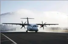  ?? ?? Water cannons at Dundee Airport to celebrate Loganair’s 60th birthday where the first flight took off in 1963.