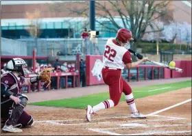  ?? (Special to the Democrat-Gazette/David Beach) ?? First baseman Linnie Malkin’s two-run home run in the fourth inning Friday provided the No. 15 Arkansas Razorbacks the only runs they’d need in a 2-0 victory over the Mississipp­i State Bulldogs at Bogle Park in Fayettevil­le. The Razorbacks were held to a season-low two hits but continued their best start to league play in school history and remain the SEC’s only undefeated team in conference play this season.