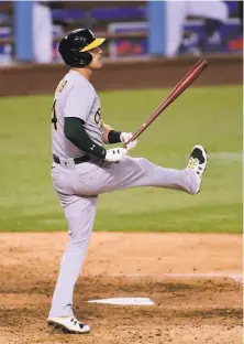  ?? Harry How / Getty Images ?? A’s third baseman Jake Lamb reacts after striking out in the seventh inning. It was one of Oakland’s 16 strikeouts.