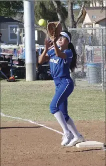  ??  ?? Central Union High's Jeweleana Rodriguez awaits a throw at first base during a home game on Wednesday afternoon. KARINA LOPEZ PHOTO