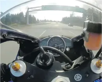  ?? YOUTUBE ?? A video screengrab from YouTube shows a motorcycli­st speeding along a British Columbia highway at up to 299 kilometres per hour. The video was posted by user Joe Blow on April 8, 2012.