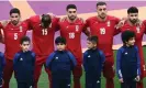  ?? Photograph: Marko Đurica/Reuters ?? Iran’s players stay silent during the national anthem in defiance of their country’s brutal crackdown on protesters.