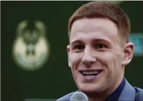  ?? MORRY GASH — THE ASSOCIATED PRESS ?? Milwaukee Bucks first-round draft pick Donte DiVincenzo, of Villanova, speaks at a news conference Monday in Milwaukee.