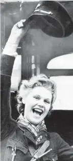  ??  ?? A Glasgow clippie showing her joy that the war was finally over on VE Day, 1945