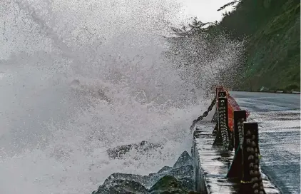  ?? Santiago Mejia/The Chronicle ?? Waves crash and go over the railing at Fort Point in San Francisco on Dec. 30, 2023.