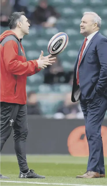  ??  ?? 0 Wales assistant Stephen Jones, left, and coach Wayne Pivac hope to halt a four-match losing run.