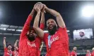  ?? Photograph: Cameron Spencer/ Getty Images ?? Adil Rashid and Moeen Ali lift the trophy together.