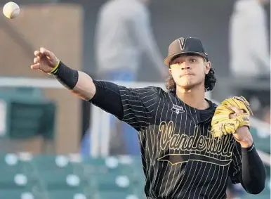  ?? RICK SCUTERI/AP ?? Vanderbilt’s Austin Martin is one of the likely choices for the Marlins with the third pick in the MLB draft.