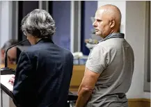  ?? LANNIS WATERS / THE PALM BEACH POST ?? Mario Perez Sainz, right, appears in court Wednesday with his public defender to face a charge of attempted murder after he allegedly beat a man with a baseball bat at a party.