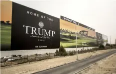  ?? The New York Times ?? A billboard for a Trump Internatio­nal Golf Course, one of the properties the Trump family has licensed its name to, alongside a highway in Dubai, United Arab Emirates, in 2017. The practice has been a staple of the family’s business.
