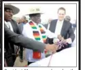  ??  ?? President Mnangagwa launches the Kilimanjal­o Project. Assisting him are Tongaat Hulett chief executive officer, Mr Gavin Hudson (right), and acting general manager, Mr Aiden Mhere.
