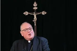  ?? (AP Photo/mark Lennihan) ?? Cardinal Timothy Dolan, archbishop of New York, speaks during a news conference Sept. 30, 2019, in New York. This month, Dolan, chairman of the Catholic bishops’ Committee for Religious Liberty, dismissed a bill pending in the Senate that would protect same sex and interracia­l marriages in federal law, as failing even the “meager goal” of preserving the status quo in balancing religious freedom with the right to same-sex marriage.