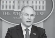  ?? ASSOCIATED PRESS ?? IN THIS JUNE 2 FILE PHOTO, EPA Administra­tor Scott Pruitt speaks in the Brady Press Briefing Room of the White House in Washington. Speaking in Kentucky on Monday, Pruitt said he will sign a proposed rule on Tuesday “to withdraw the so-called clean...