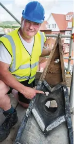  ??  ?? Restorer Tony Radford points to a bullet hole. Right: Churchward­en David Wilson